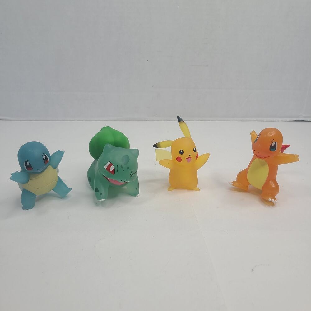 Lot of 4 Translucent Pokemon Battle Figures Pikachu Charzard Squirttle Bul 2022